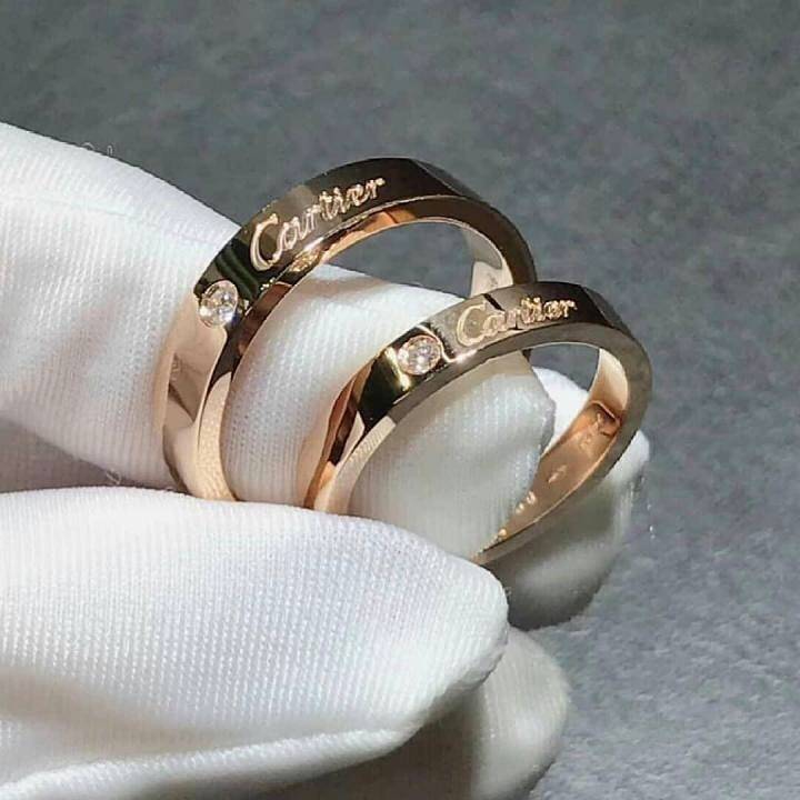 Оригинальные обручальные кольца из красного золота с различными вставками