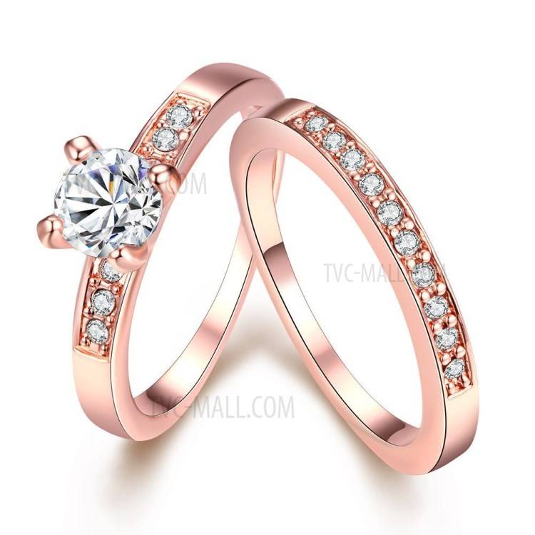 Обручальные кольца из розового золота с бриллиантом