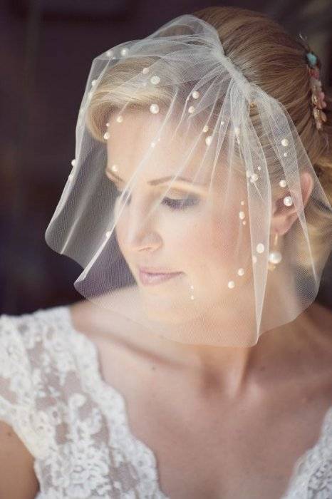 Романтичный аксессуар для невесты – свадебная вуаль