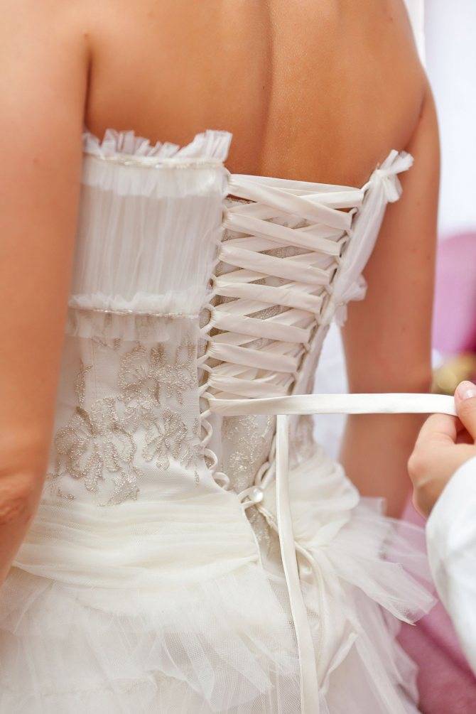 Три способа как шнуровать свадебное платье: видео, фото и схема процесса