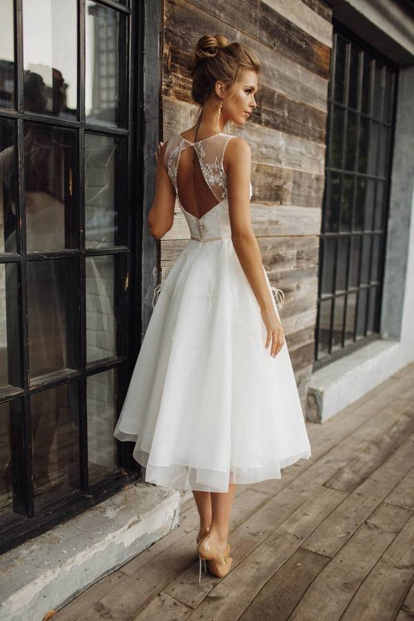 Безумная красота свадебного платья: модели короткие спереди, но длинные сзади